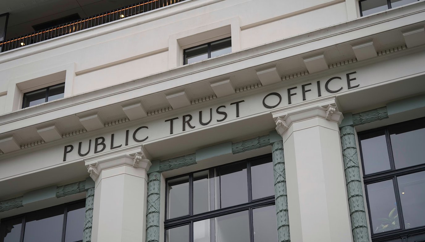 Facade of a public trust office building representing professional services